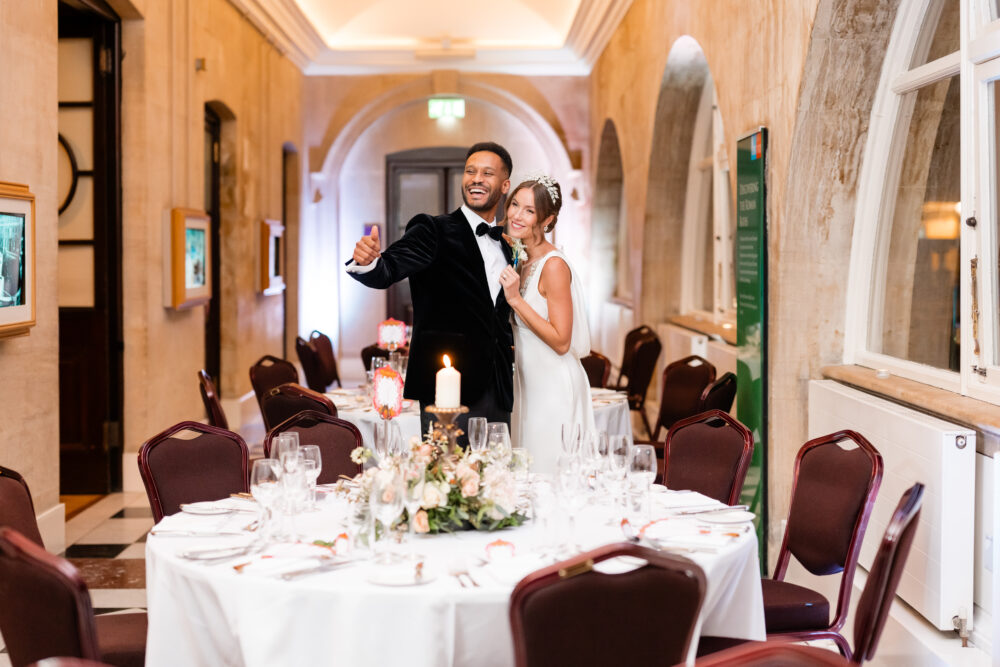 Image of wedding couple at the Royal Baths, Bath, the groom wears suit and shirt from Gabucci Menswear Bath, for Bath Royal Baths, shot by RICH HOWMAN & ELAN IMAGES LTD